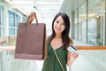 Woman holding shopping bag and credit card Royalty Free Stock Photo