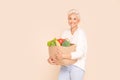Woman holding shopping bag with healthy food Royalty Free Stock Photo
