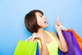 woman holding shopping bags and looking up Royalty Free Stock Photo