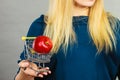 Woman holding shopping cart with apple inside Royalty Free Stock Photo