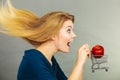 Woman holding shopping cart with apple inside Royalty Free Stock Photo