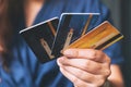 A woman holding and showing credit cards Royalty Free Stock Photo
