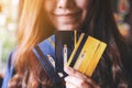 A woman holding and showing credit cards Royalty Free Stock Photo