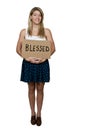 Woman Holding Sign that says Blessed Royalty Free Stock Photo