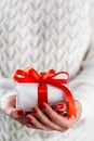 Woman holding small red gift box Royalty Free Stock Photo