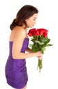 Woman Holding and Smelling Roses Royalty Free Stock Photo