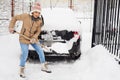 Woman holding snow shovel