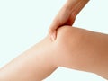 Woman holding sore knee Royalty Free Stock Photo