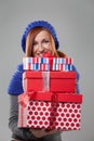 Woman Holding Stack of Christmas Presents Royalty Free Stock Photo