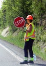 Woman holding stop sign Royalty Free Stock Photo