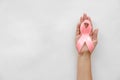 Woman holding symbolic ribbon of breast Royalty Free Stock Photo