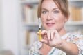 Woman is holding syringe with insulin or heparin