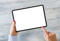 Woman holding tablet with empty screen