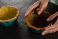 Woman holding tart dough on mold