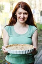 Woman holding tart Royalty Free Stock Photo