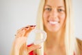 Woman holding teeth whitening tray Royalty Free Stock Photo