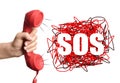 Woman holding telephone handset on white background, closeup. Emergency SOS call Royalty Free Stock Photo