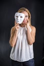 Woman holding theatre mask Royalty Free Stock Photo