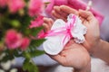 Woman holding tiny socks in her nands