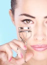 Woman holding tool for eyelash