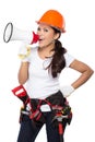 Woman holding tool and megaphone Royalty Free Stock Photo