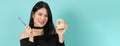 Woman holding toothbrush and dental teeth model. Oral health care concept Royalty Free Stock Photo