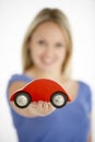 Woman Holding Toy Car Royalty Free Stock Photo