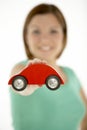 Woman Holding Toy Car Royalty Free Stock Photo