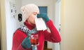 Woman blowing nose as cold season concept Royalty Free Stock Photo