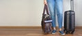 Woman holding travel pet carrier with a pug dog inside ready to get on board the airplane at the airport. Holidays with Royalty Free Stock Photo