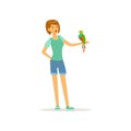 Woman holding tropical bird with colored feathers on her hand. Smiling female character and macaw parrot. Pet and Royalty Free Stock Photo