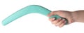 Woman holding turquoise boomerang on white, closeup