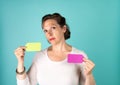 Woman holding two blank note tags up with room for your copy Royalty Free Stock Photo