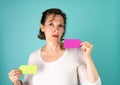 Woman holding two blank note tags up with room for your copy Royalty Free Stock Photo