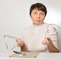 Woman with glasses and magnifying glass Royalty Free Stock Photo