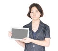 Woman holding up blank tablet computer