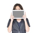 Woman holding up blank tablet computer