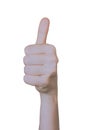 Woman holding up hand showing the thums up or I Like sign Royalty Free Stock Photo