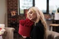 Woman holding valentines day red roses box Royalty Free Stock Photo