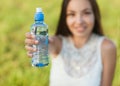 Woman holding water Royalty Free Stock Photo