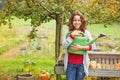 Woman holding watering-can