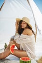 Woman on the Tropical Beach Eating Watermelon Royalty Free Stock Photo