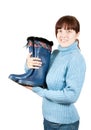 Woman holding waterproof welly Royalty Free Stock Photo