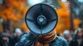 Woman Holding Yellow and Black Megaphone Royalty Free Stock Photo