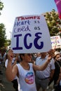 Woman Holds Anti-ICE Sign At Atlanta Immigration Protest