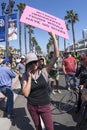 Woman holds anti-Trump sign at protest