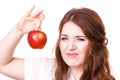 Woman holds apple fruit, isolated