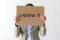 A woman holds a banner with the inscription I KNEW IT Royalty Free Stock Photo