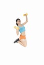 Woman holds dumbbells and jump Royalty Free Stock Photo