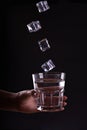 Woman holds a glass of water. Royalty Free Stock Photo